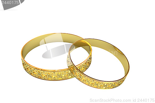 Image of Golden wedding rings with magic tracery