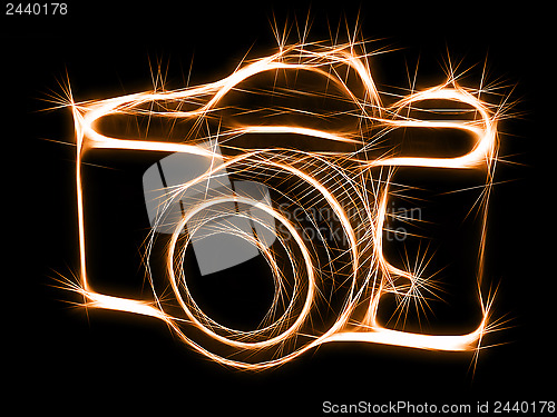 Image of Sparkling silhouette of photocamera