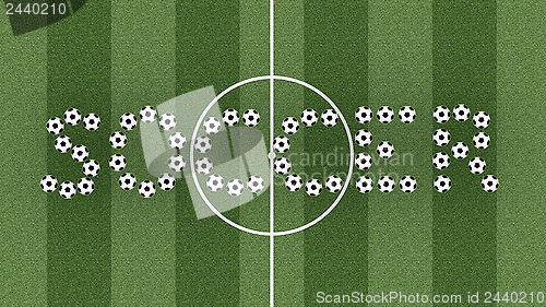 Image of Soccer word on green grass field
