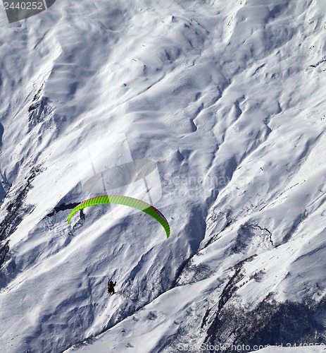 Image of Speed flying in winter mountains