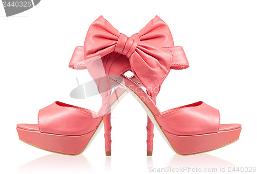 Image of Evening shoes with a bow on a high heel. collage