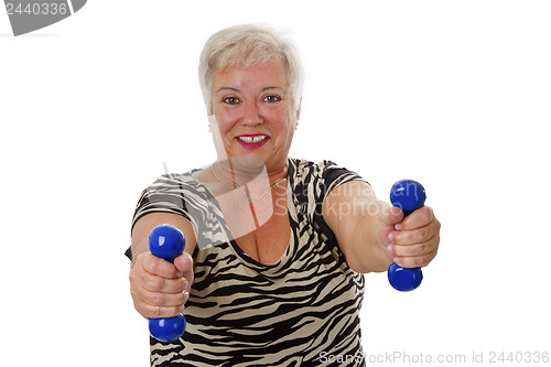 Image of Female senior with dumbbell