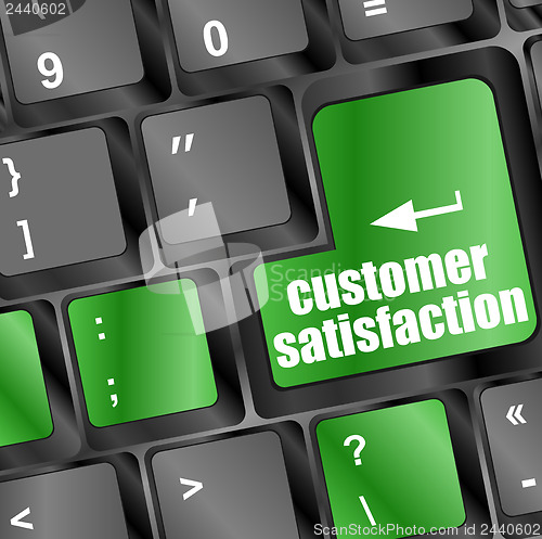 Image of customer satisfaction key word on computer keyboard