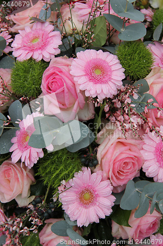 Image of Pink gerberas and roses in a wedding arrangement