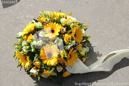 Image of Yellow sympathy flowers