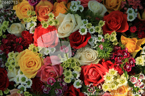 Image of Mixed colorful wedding flower arrangement