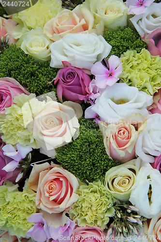 Image of purple, pink and white wedding centerpiece