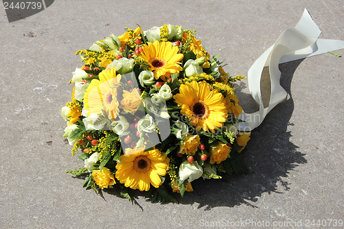 Image of Yellow sympathy flowers