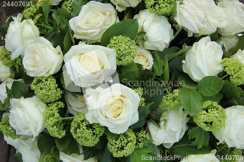 Image of White and green wedding arrangement