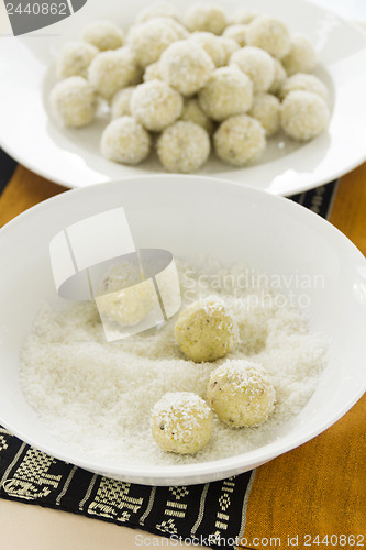 Image of Rolling Burfi In Coconut