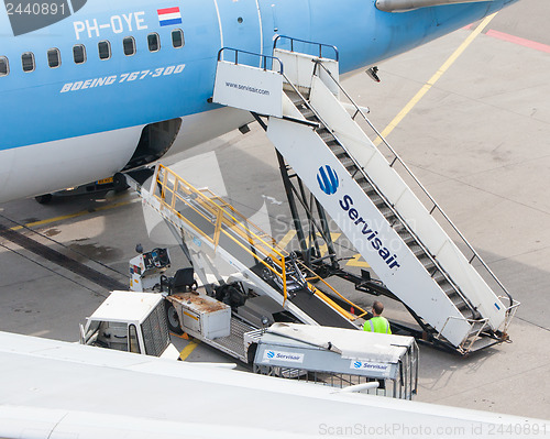 Image of AMSTERDAM - SEPTEMBER 6: KLM plane is being loaded at Schiphol A