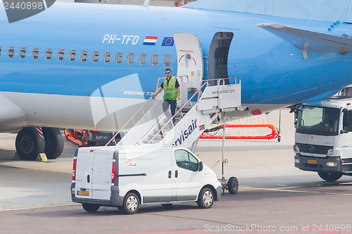 Image of AMSTERDAM - SEPTEMBER 6: KLM plane is being inspected at Schipho