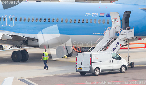 Image of AMSTERDAM - SEPTEMBER 6: KLM plane is being inspected at Schipho