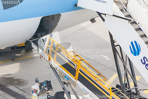 Image of AMSTERDAM - SEPTEMBER 6: KLM plane is being loaded at Schiphol A