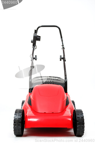 Image of new red lawnmower on white background