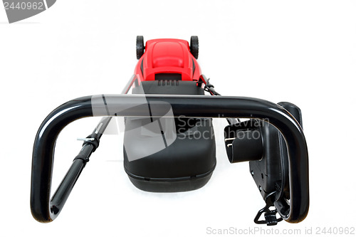 Image of new red lawnmower on white background