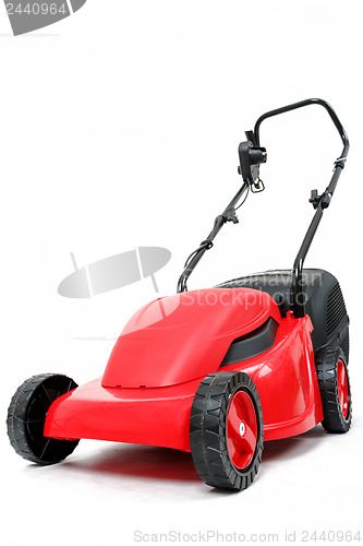 Image of new red lawnmower on white background