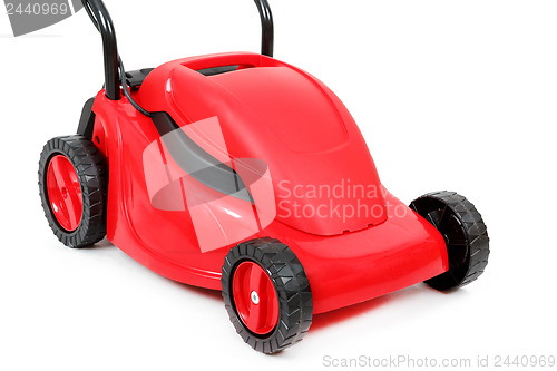 Image of new red lawnmower on white background