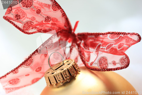 Image of Christmas decorations in red and gold