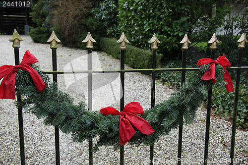 Image of Garland on a fence