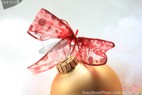 Image of Christmas decorations in red and gold