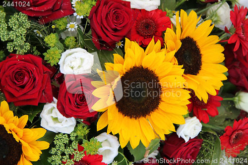 Image of Sunflowers and roses