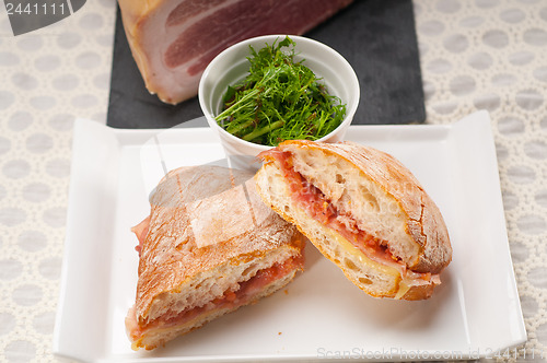 Image of ciabatta panini sandwich with parma ham and tomato