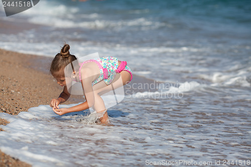 Image of Little girl at the beach