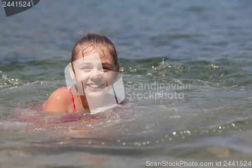 Image of Young girl in the sea