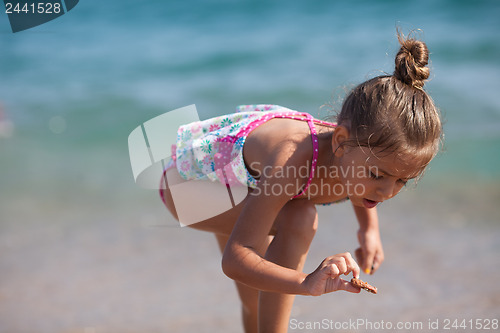 Image of Little girl at the beach