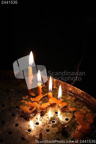 Image of bright burning church candles