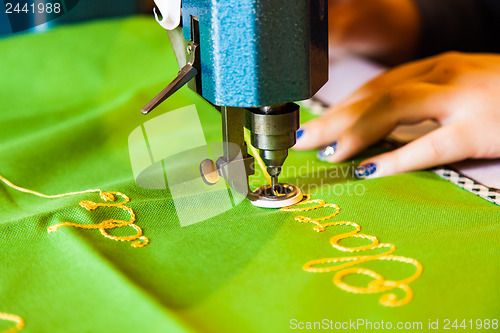 Image of Lady hand at sewing