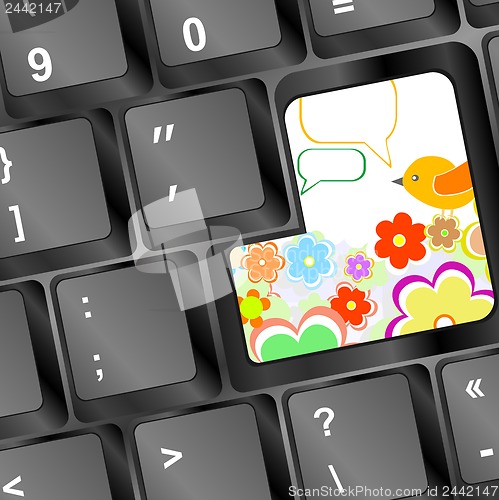 Image of Modern keyboard button, flower and bird