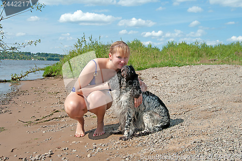 Image of Girl and dog.
