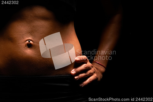 Image of Upper body of a muscular woman