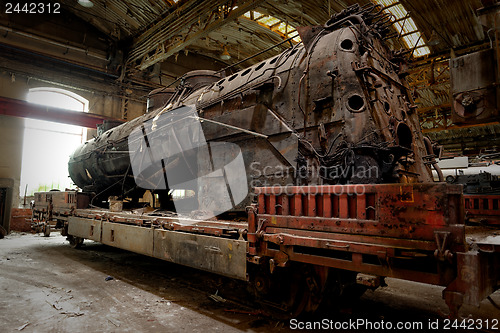 Image of Old industrial locomotive in the garage