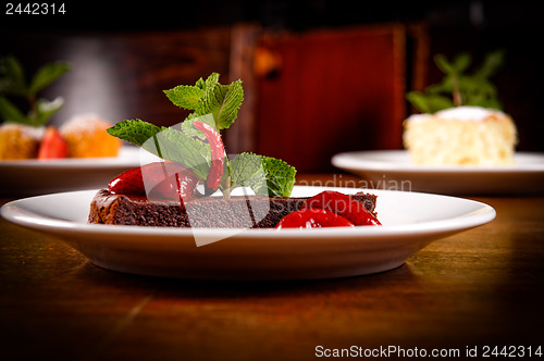 Image of Chocolate cake wth strawberry and chili