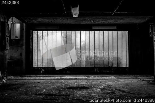 Image of Large old window of a factory