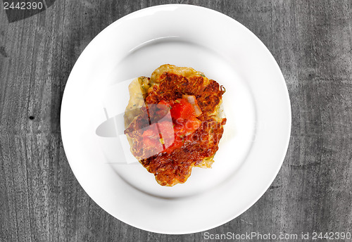 Image of Fried chicken ribs and rice with tomato sauce