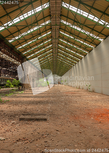 Image of Abandoned industrial interior with bright light