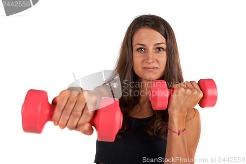 Image of Young woman in the studio with weights