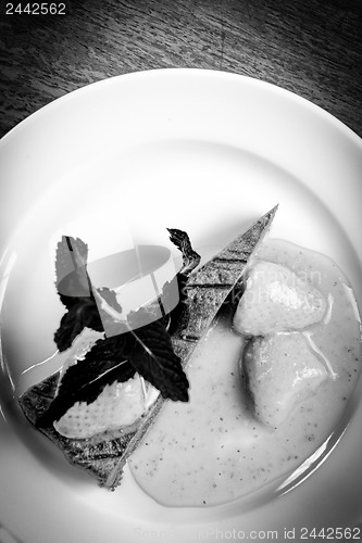 Image of Chocolate cake wth strawberry and chili