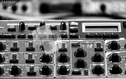 Image of Closeup photo of an audio mixer