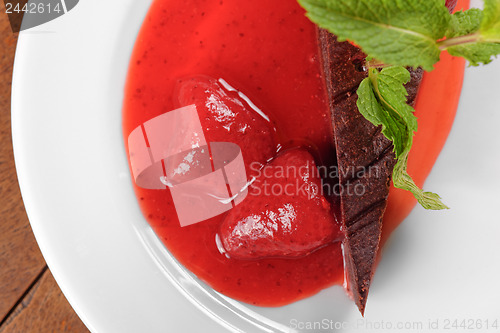 Image of Chocolate cake with strawberry and chili