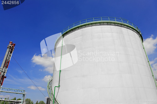Image of Large industrial silo with blue sky