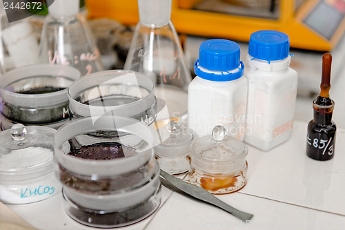 Image of old laboratory with a lot of bottles