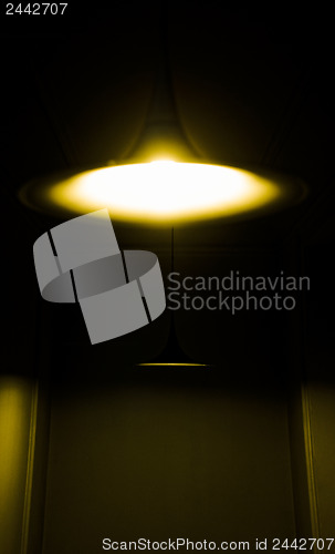 Image of Bright lights in dark corridor