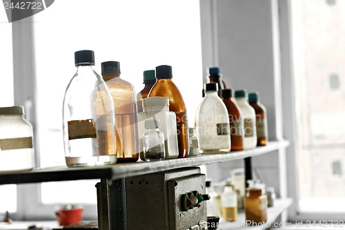 Image of Old laboratory with a lot of bottles