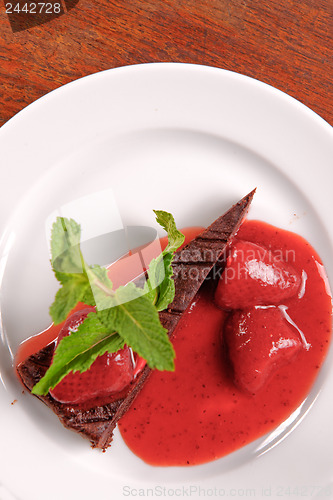 Image of Chocolate cake with strawberry and chili