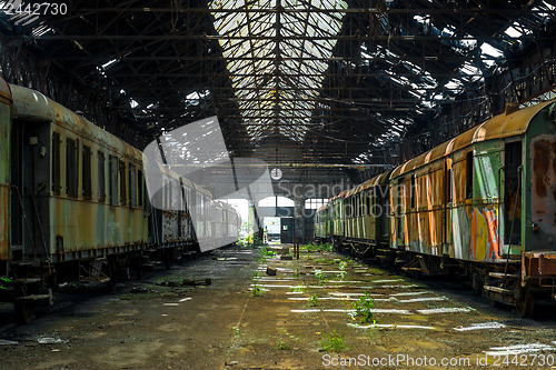 Image of Cargo trains in old train depot